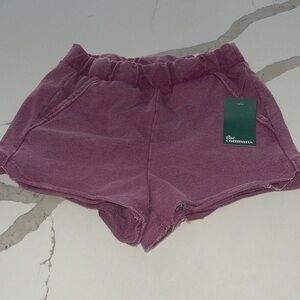 The commons purple sweat shorts Medium